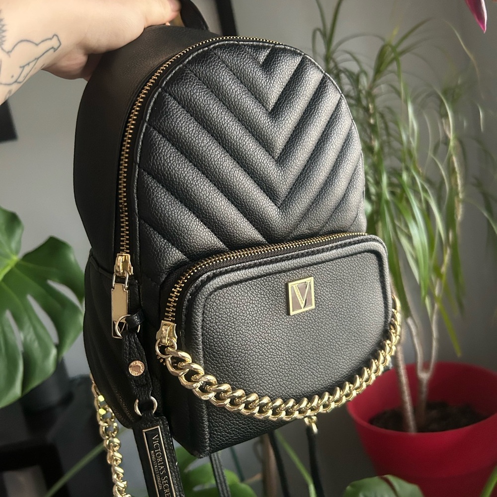 Black Quilted Backpack with Gold Accents
